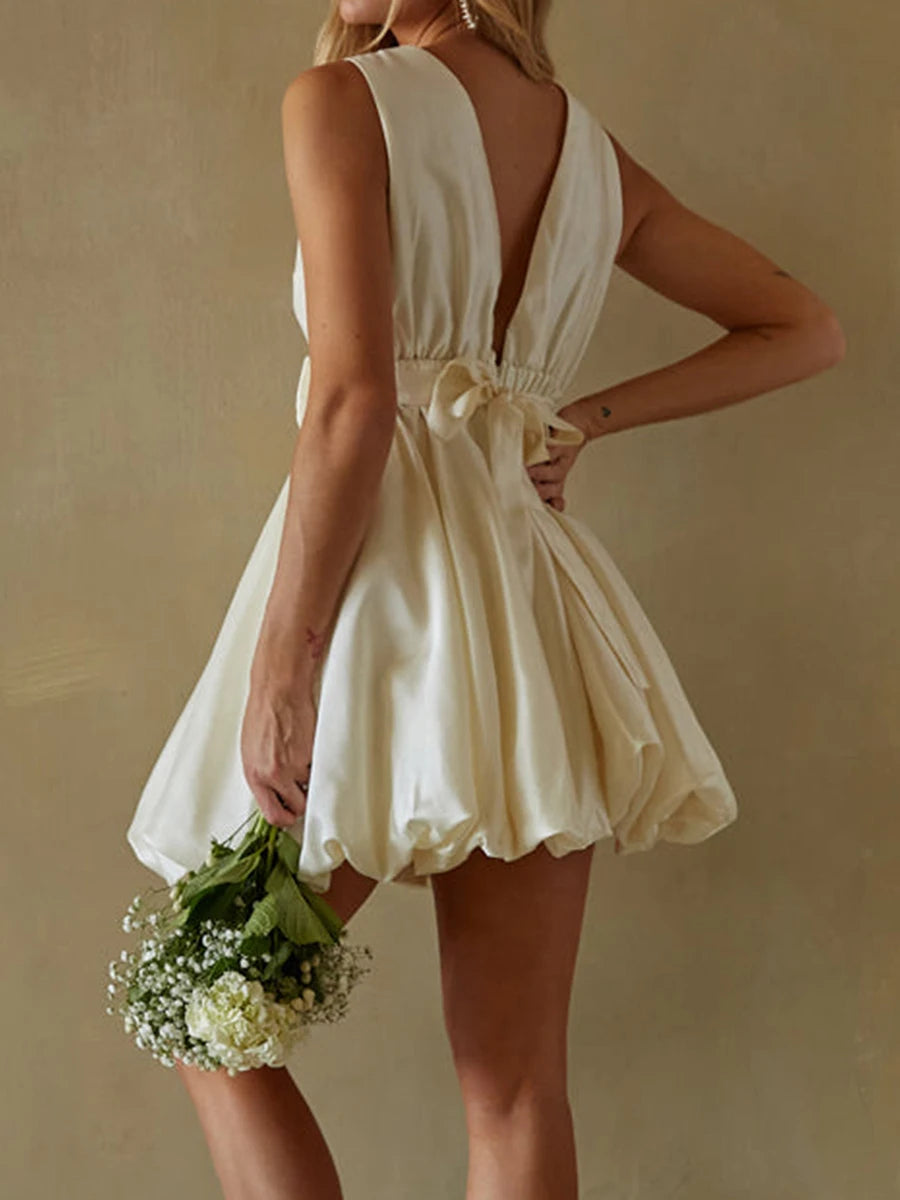 Elegant Babydoll Dress with Ruffle Bubble Hemline and Bow Belt