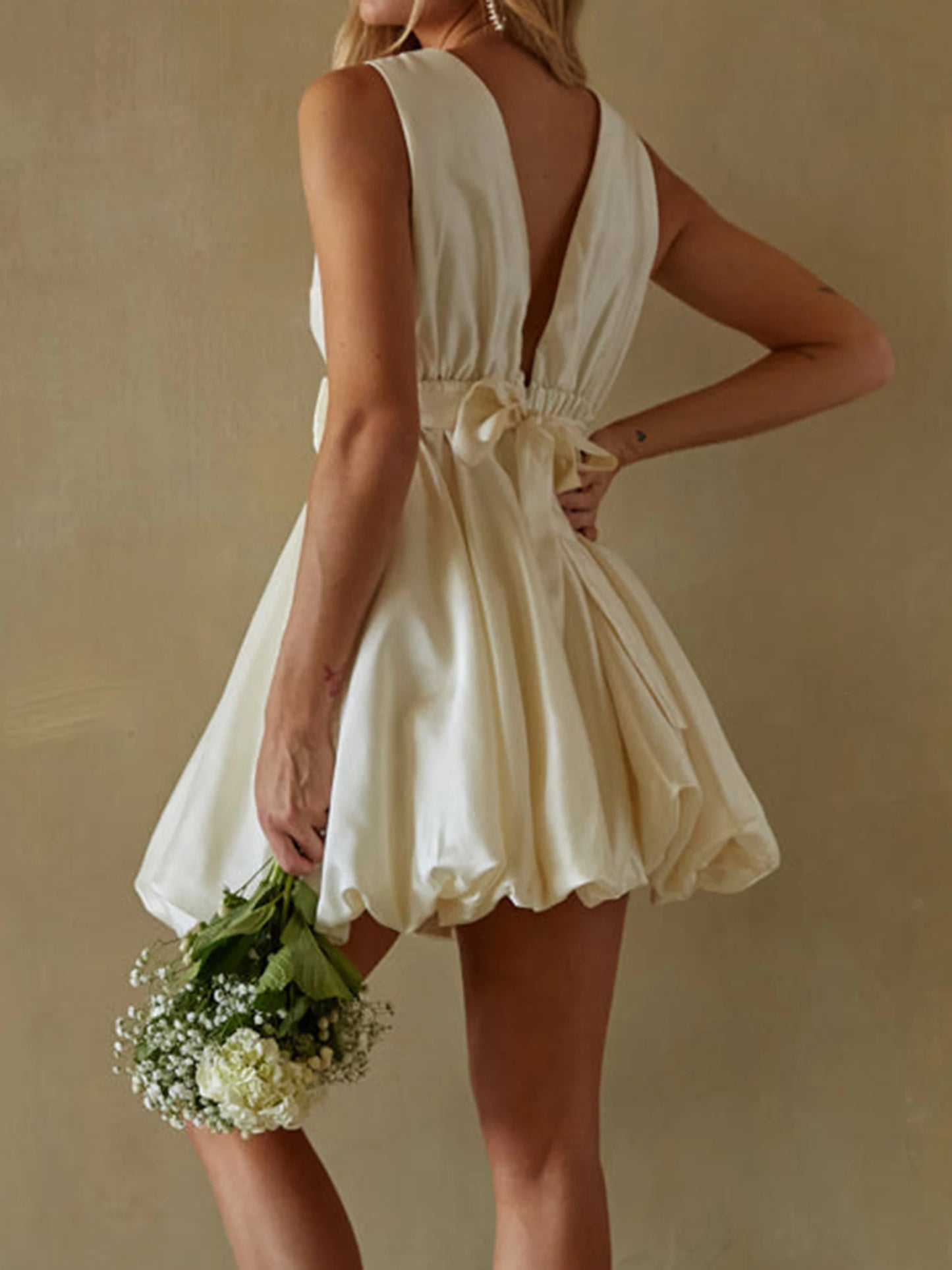 Elegant Babydoll Dress with Ruffle Bubble Hemline and Bow Belt